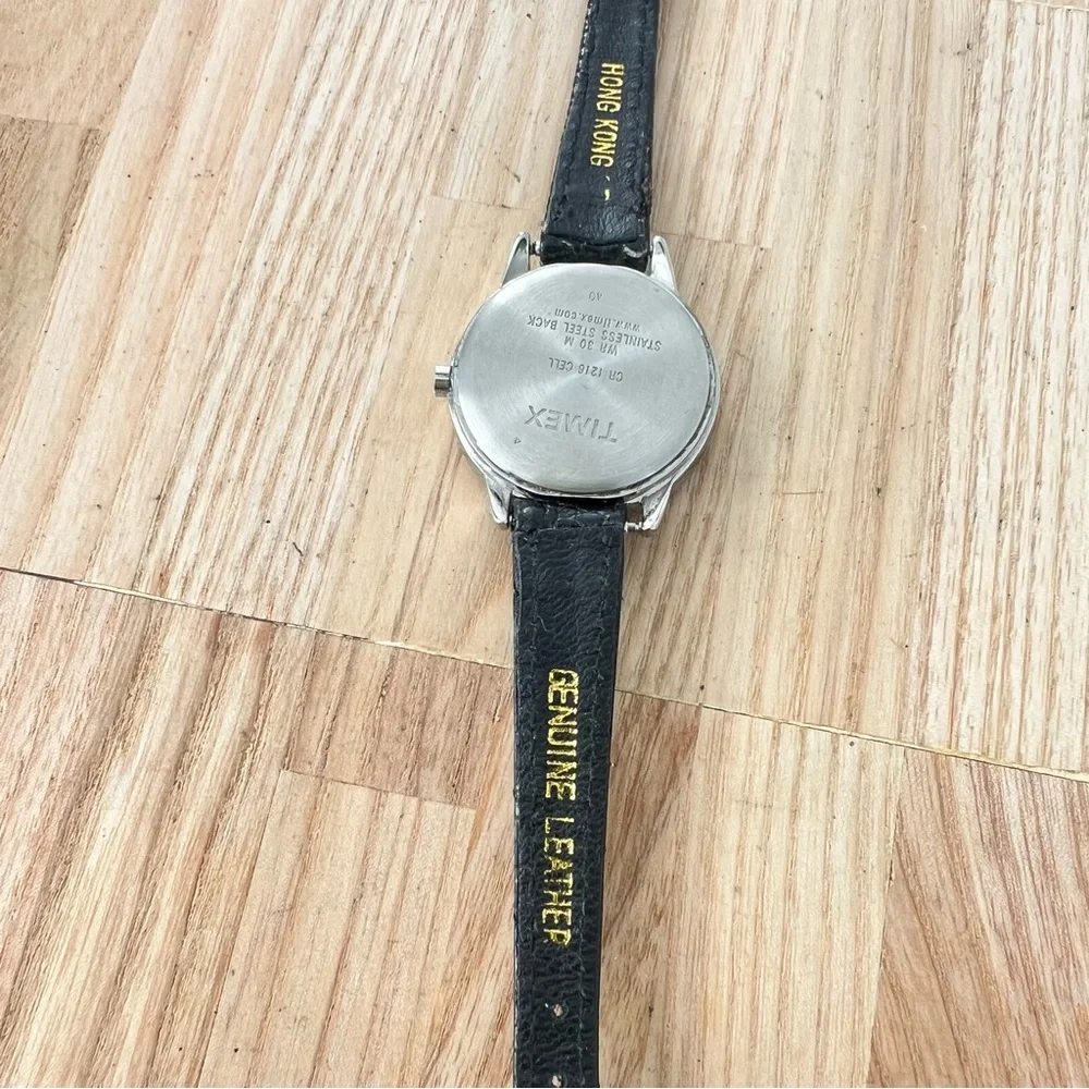 Timex ladies silver tone black leather watch NEW BATTERY